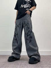 A knife thorn-printed patchwork wide-leg denim pants