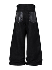 A knife high street patchwork python leather riveted denim pants