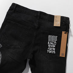 Ksubi Vintage Wash Black Cross Graphic Denim Jeans