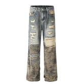 A knife high street style jeans with a torn and patched design