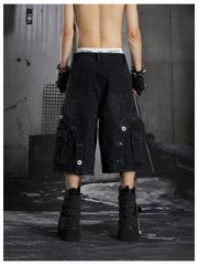 NOMANIAI Darkly stitched metal-embroidered shorts