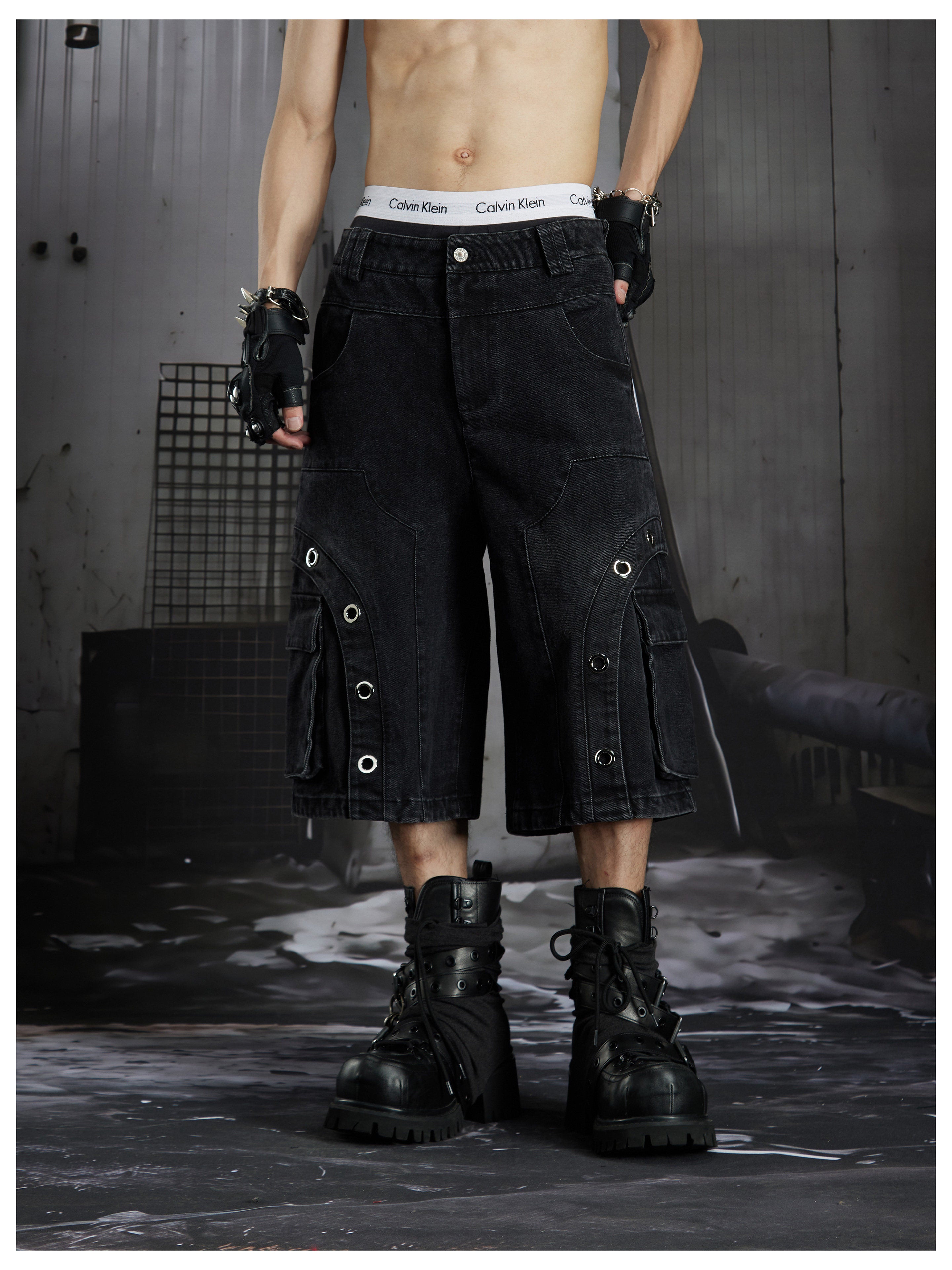 NOMANIAI Darkly stitched metal-embroidered shorts
