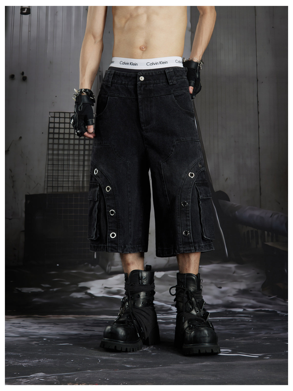 NOMANIAI Darkly stitched metal-embroidered shorts