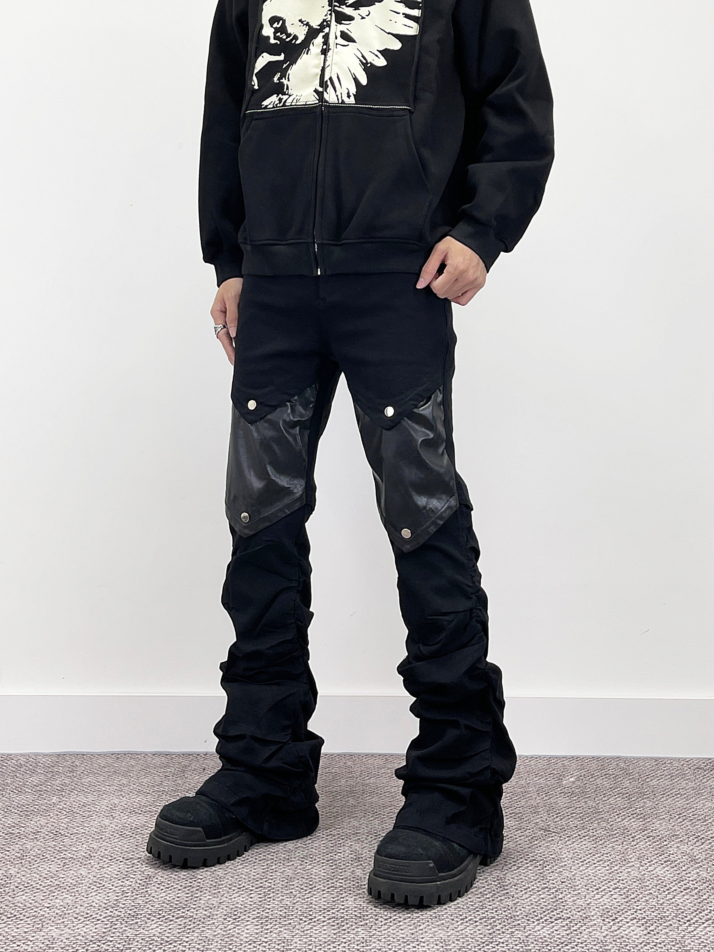 A knife punk leather flared denim pants
