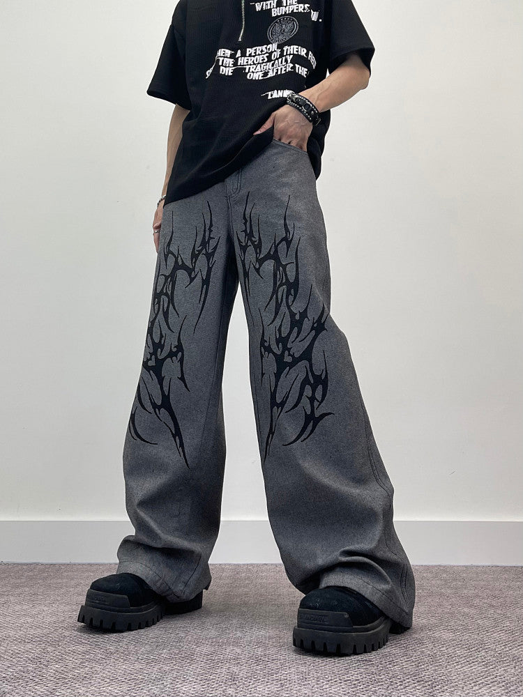 A knife thorn-printed patchwork wide-leg denim pants