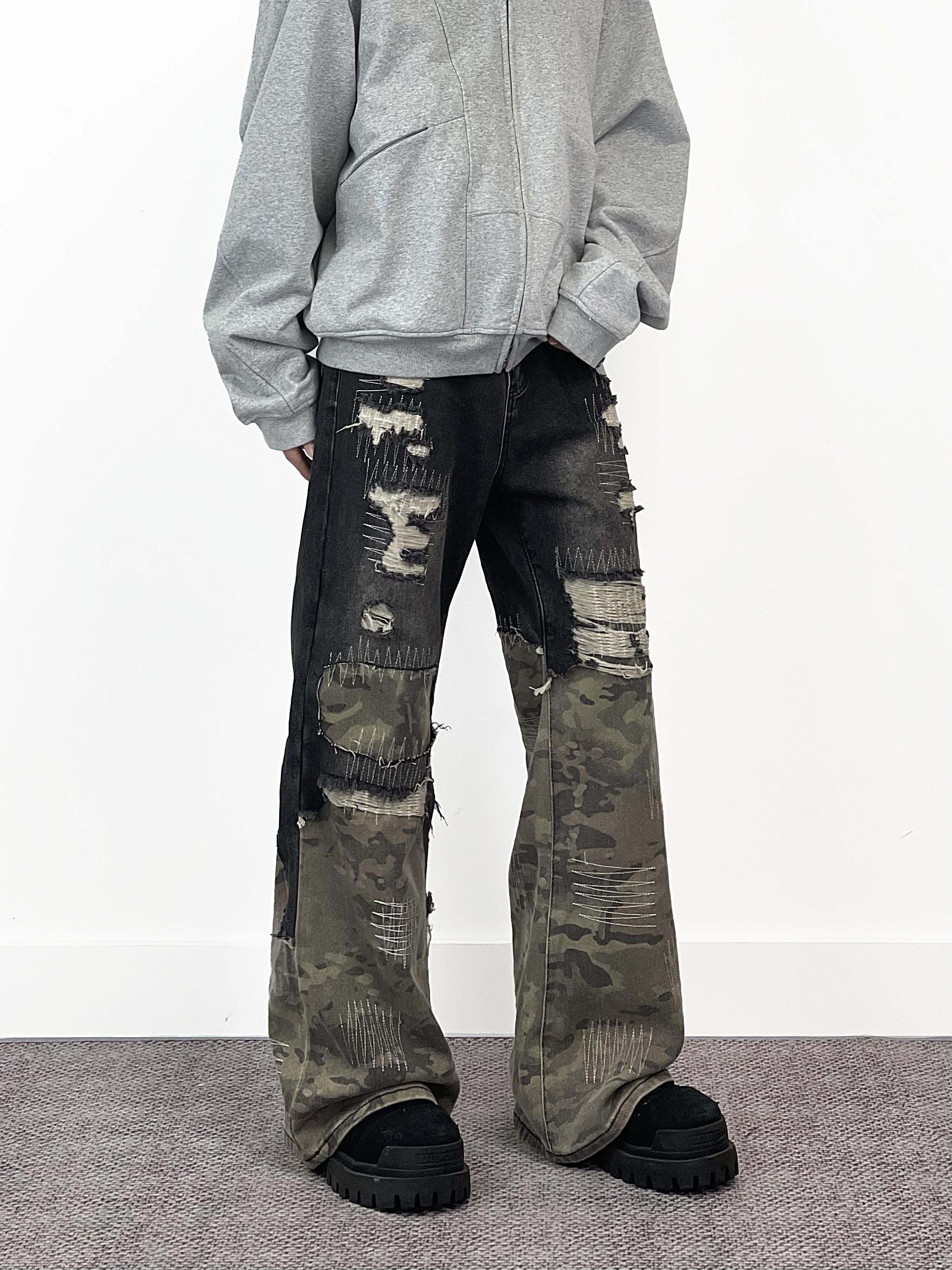A knife high street style jeans with a torn and patched design