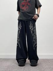 A knife high street thorn-embroidered wide-leg jeans