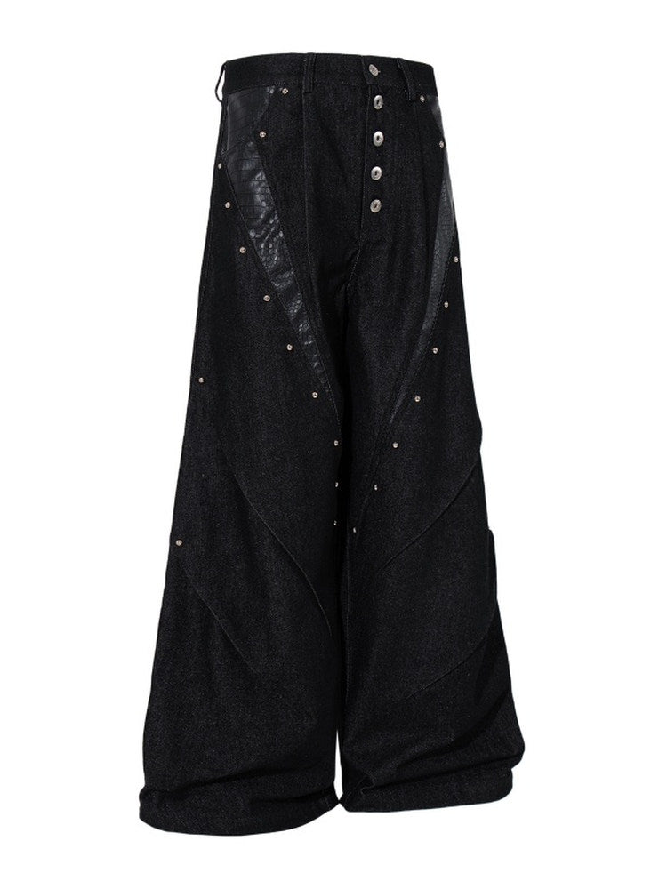 A knife high street patchwork python leather riveted denim pants