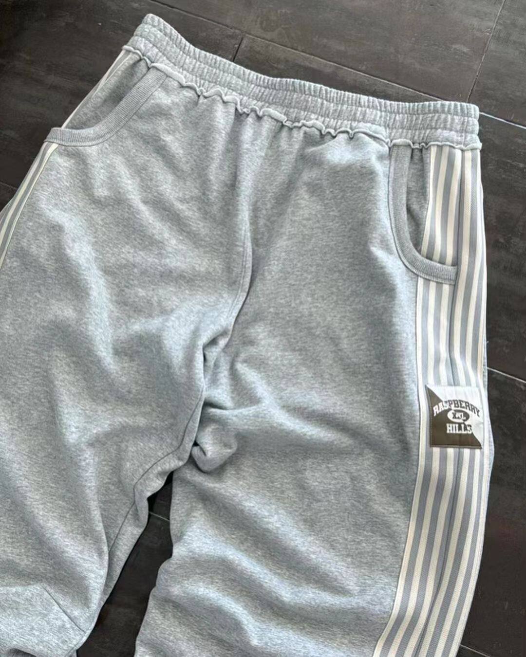 KOBPt Sweatpants with side stripe detailing, straight-leg style