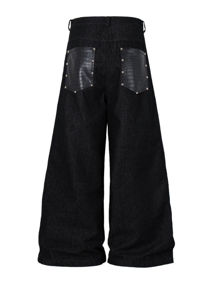 A knife high street patchwork python leather riveted denim pants