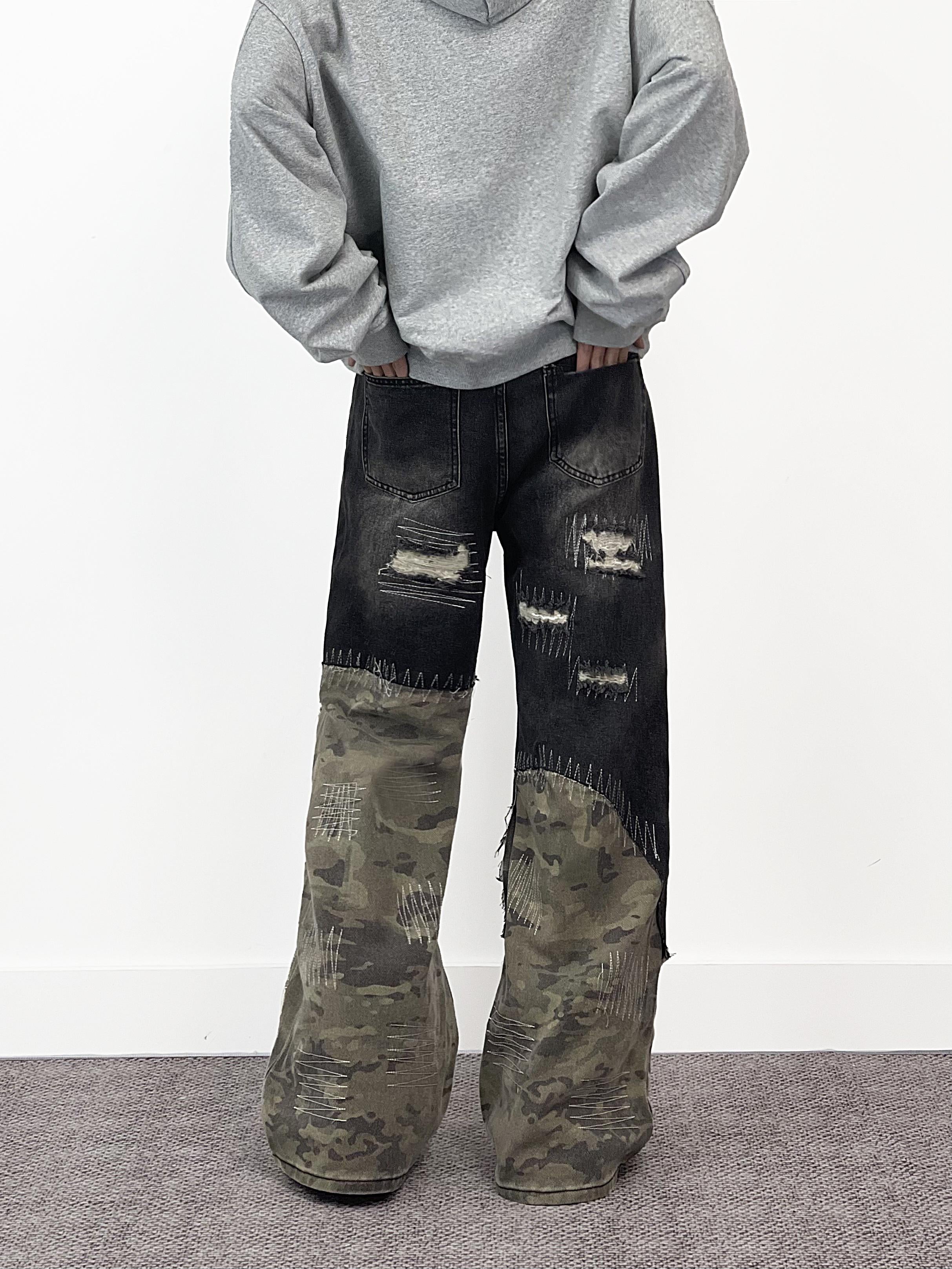 A knife high street style jeans with a torn and patched design