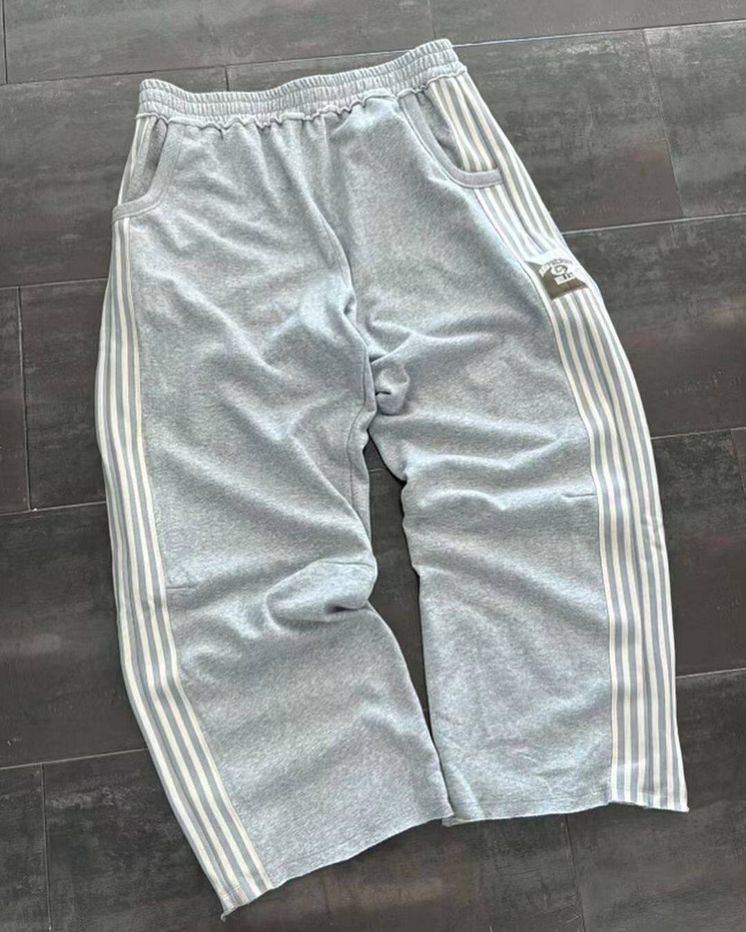 KOBPt Sweatpants with side stripe detailing, straight-leg style