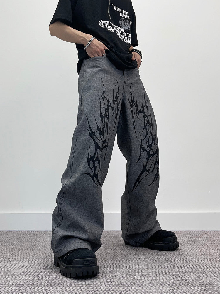 A knife thorn-printed patchwork wide-leg denim pants