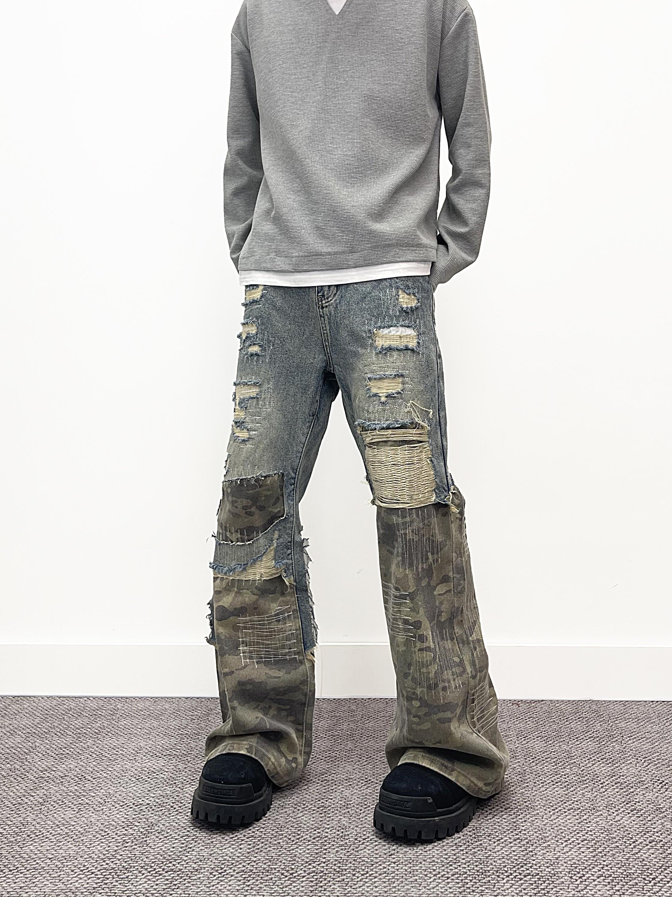 A knife high street style jeans with a torn and patched design