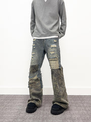 A knife high street style jeans with a torn and patched design