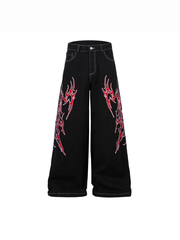 A knife flame embroidered wide-leg jeans