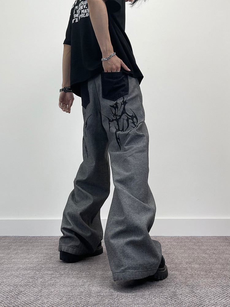 A knife thorn-printed patchwork wide-leg denim pants