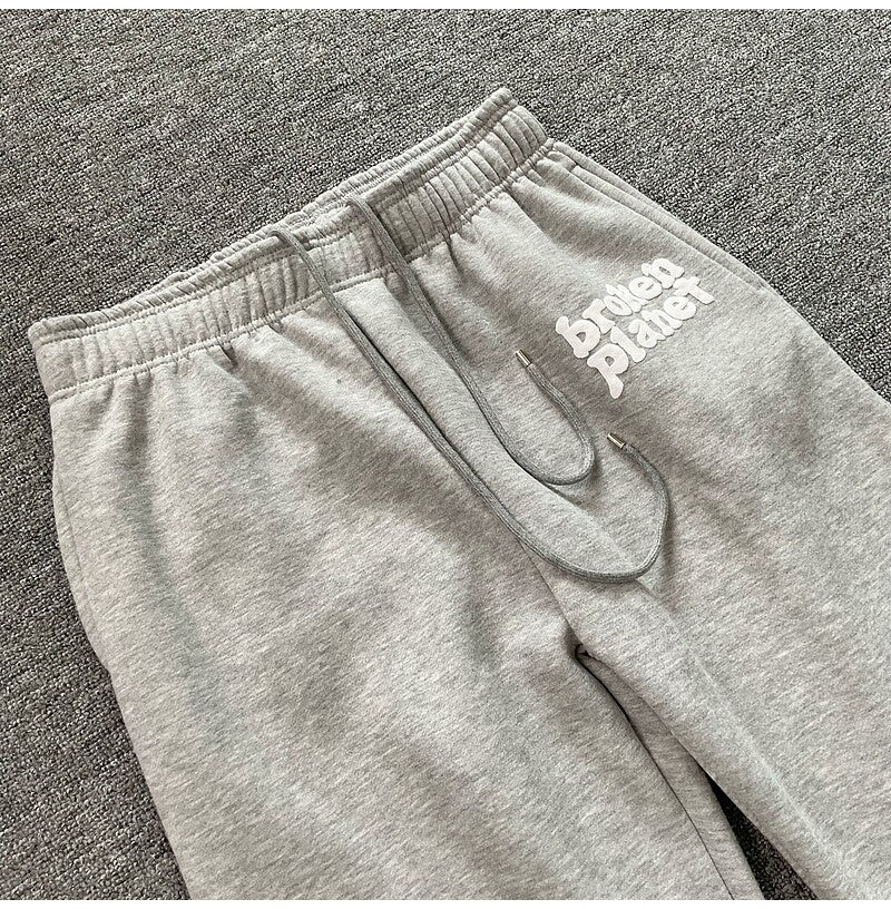 Broken Planet print straight-leg casual pants