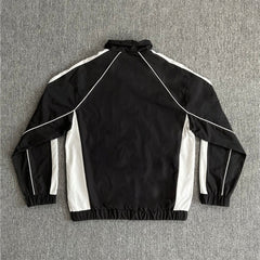 Rhude Contrasting color sportswear with zippers