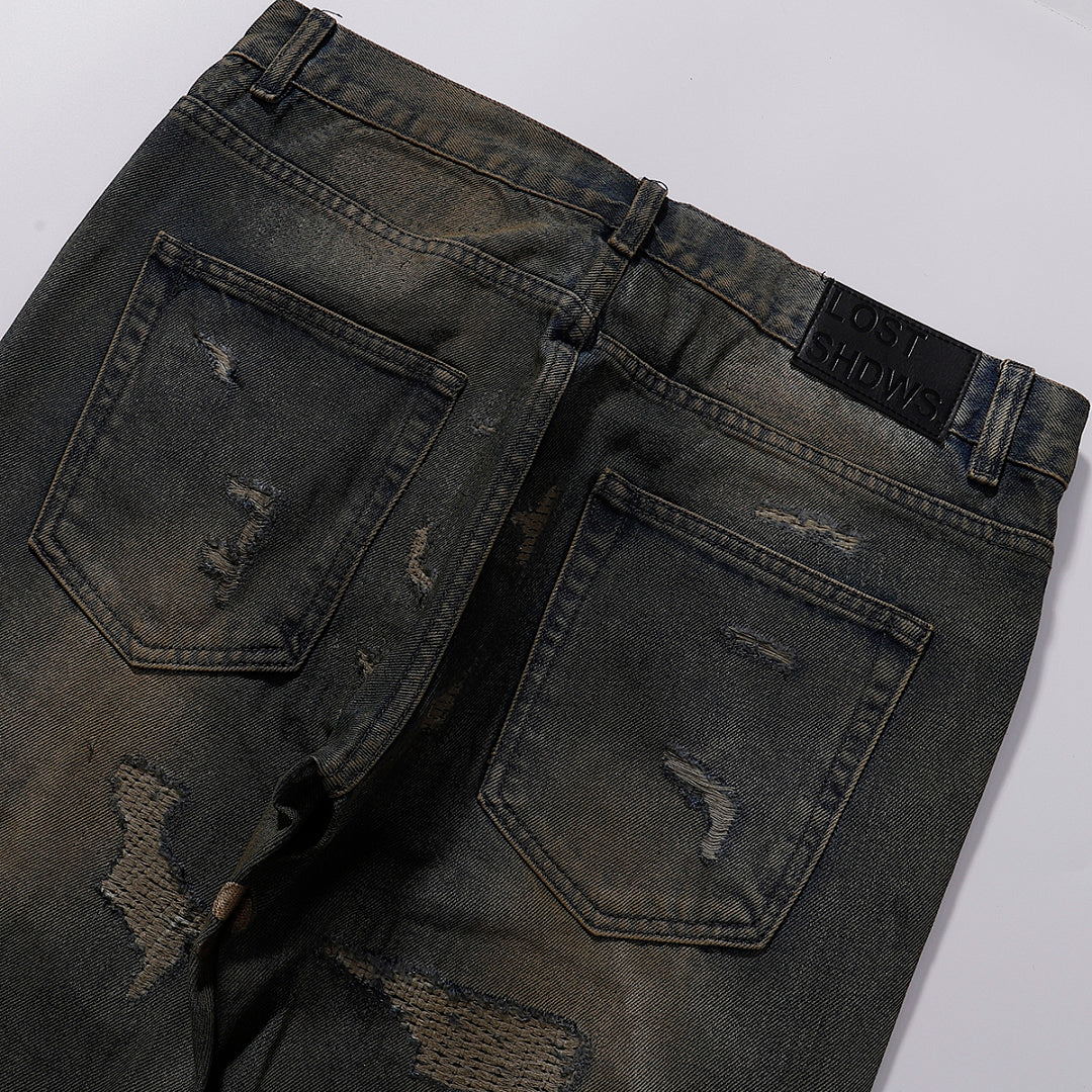 LOST SHDWS Waxed Distressed Mud Wash Denim Jeans