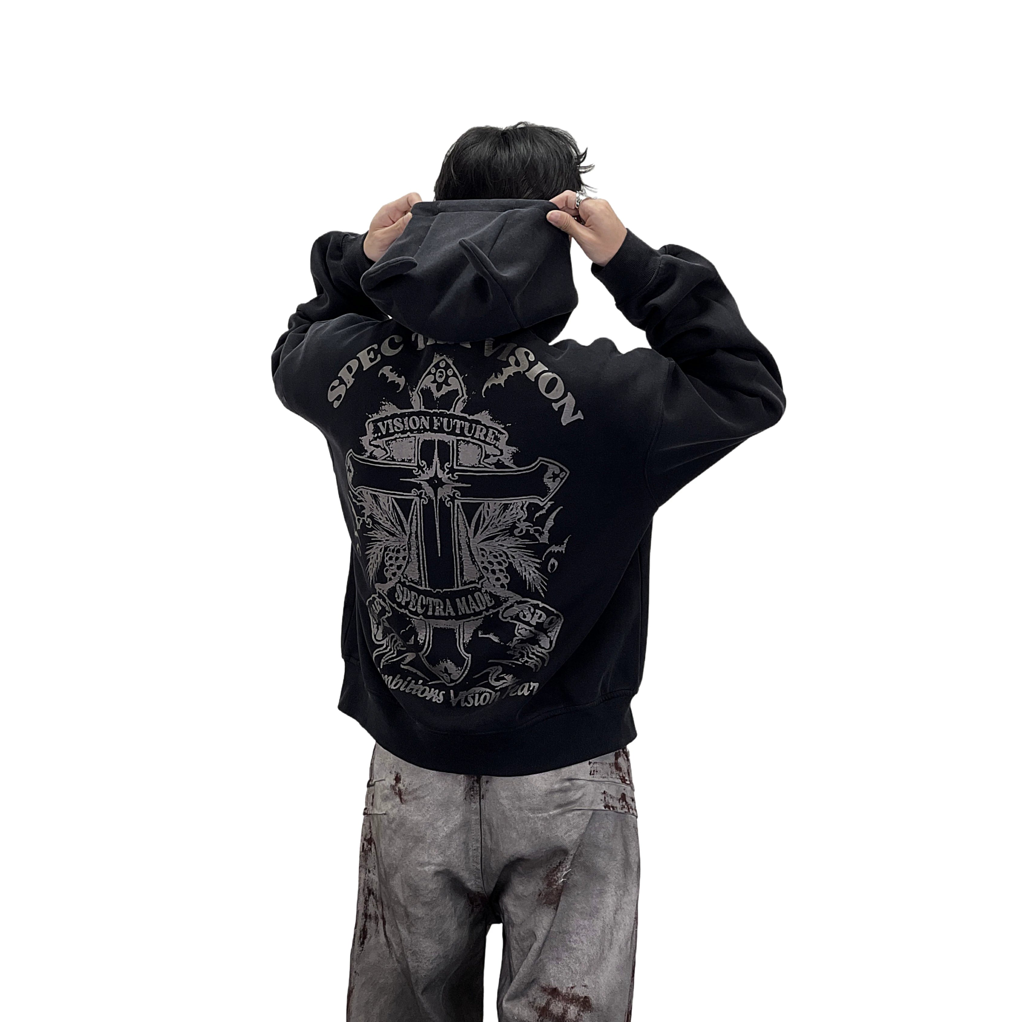 A heavyweight hoodie with a knitted cross pattern