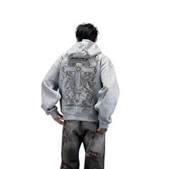 A heavyweight hoodie with a knitted cross pattern