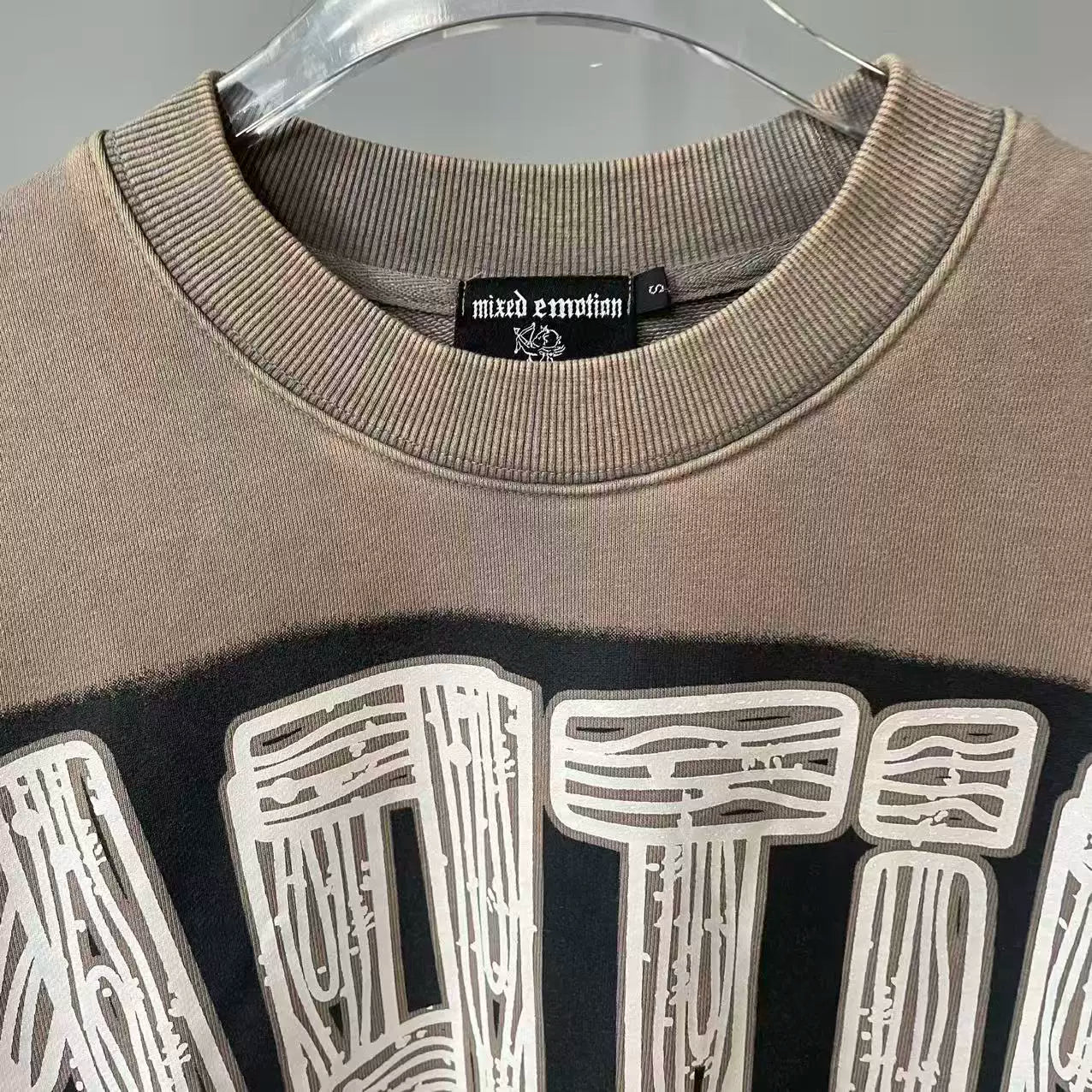 MIXED EMOTION Washed Allover Print Sweatshirt