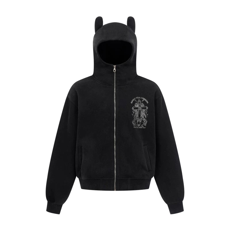 A heavyweight hoodie with a knitted cross pattern