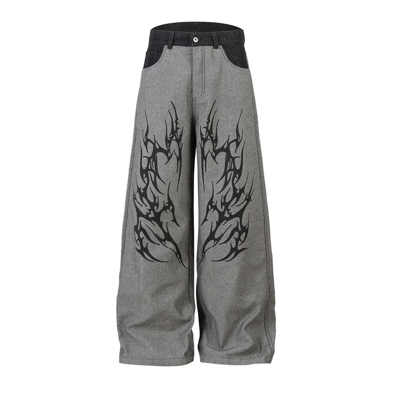 A knife thorn-printed patchwork wide-leg denim pants